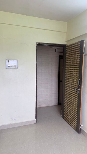 Bedroom in 2 BHK Apartment at Ravindra Heights, Titwala – for Sale