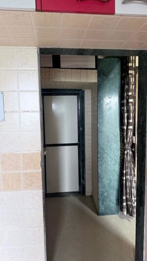 Building Lobby in 2 BHK Apartment at Ravindra Heights, Titwala – for Sale