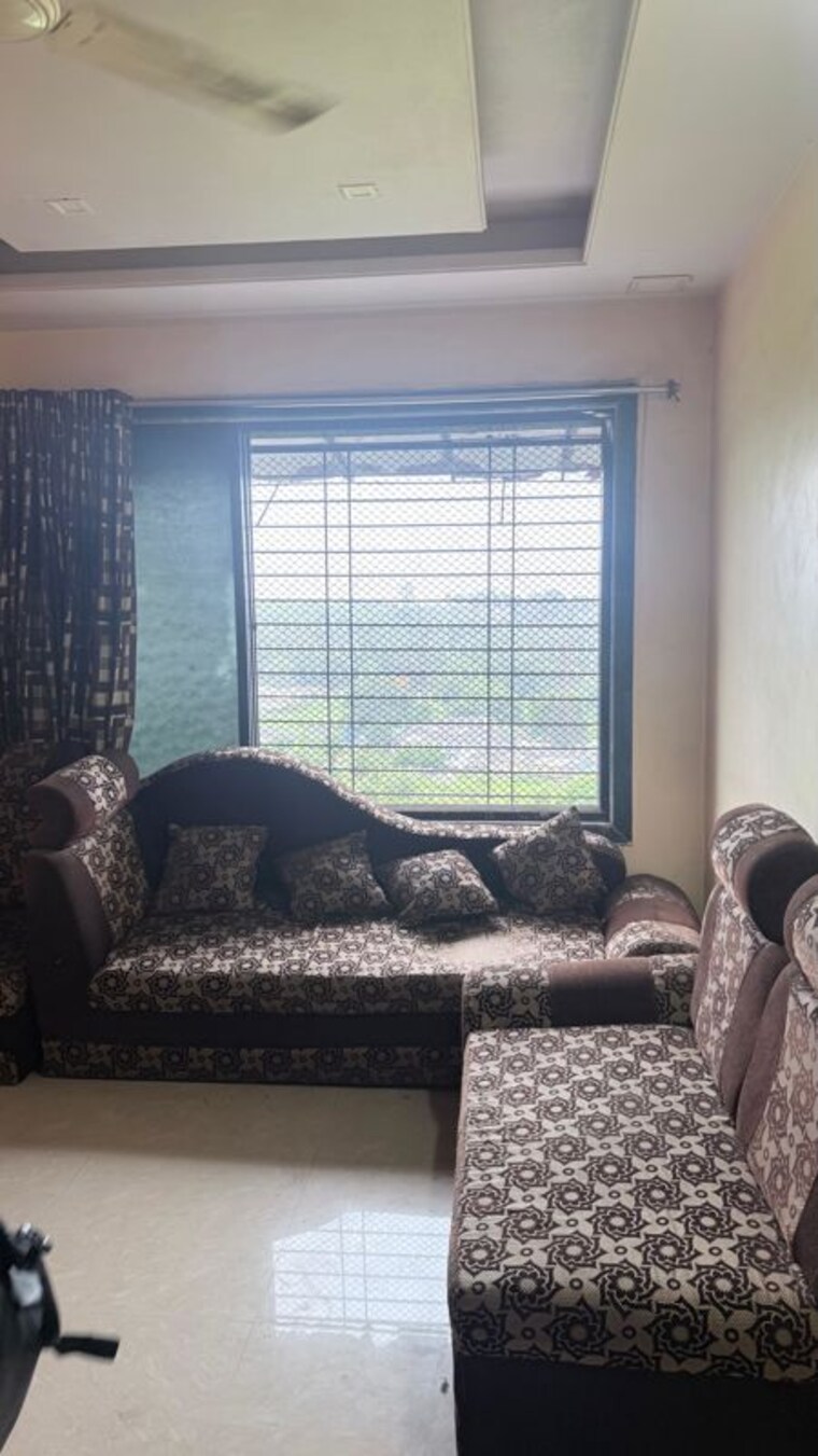 Living Room, ravindra-heights 2 Bedroom 916 Sq.Ft. Apartment In Titwala Thane 10601829