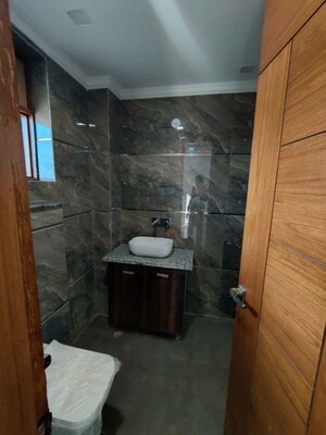 Bathroom in 4 BHK Builder Floor at Green Fields Colony – for Rent