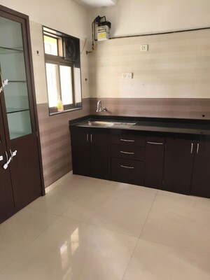 Kitchen in 2.5 BHK Apartment at Dosti Vihar, Samata Nagar – for Rent
