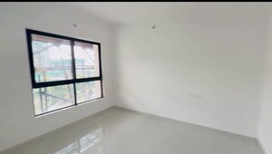 Room in 2 BHK Apartment at Pride World City, Charholi Budruk – for Rent