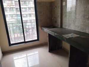 Kitchen in 1 BHK Apartment at Swaraj Heights, Karanjade – for Sale