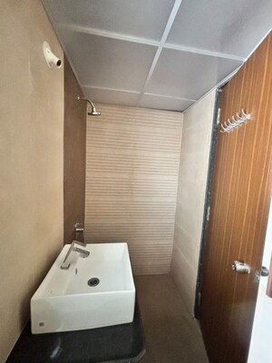 Bathroom in 2 BHK Apartment at Kohinoor Sportsville, Hinjewadi – for Rent