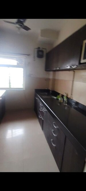 Kitchen in 2 BHK Apartment at Cosmos Classique, Ghodbunder Road – for Rent