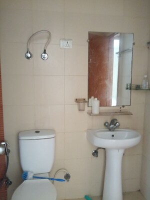Bathroom in 4 BHK Apartment at Mahagun My Woods, Sector 16c Greater Noida – for Rent
