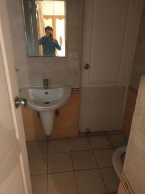 Bathroom in 3 BHK Apartment at Dew Drop Apartments, Sector 47 – for Rent