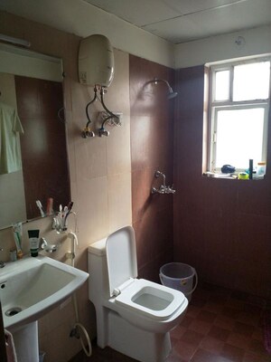 Bathroom in 3 BHK Apartment at Aims Golf Avenue II, Sector 75 – for Rent