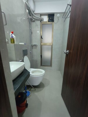 Bathroom in 2 BHK Apartment at Raymond Ten X Habitat, Pokhran Road No Two – for Rent
