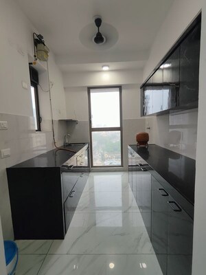 Kitchen in 2 BHK Apartment at Raymond Ten X Habitat, Pokhran Road No Two – for Rent