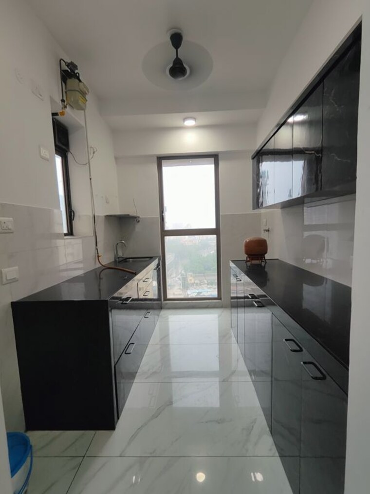 Kitchen, raymond-ten-x-habitat 2 Bedroom 670 Sq.Ft. Apartment In Pokhran Road No Two Thane 10602056