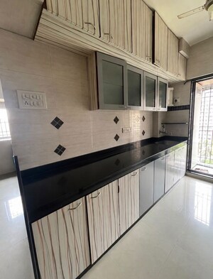 Kitchen in 2 BHK Apartment at Raunak Unnathi Gardens, Pokhran Road No One – for Rent