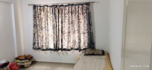 Bedroom in 2 BHK Apartment at G K Rajaveer Palace, Pimple Saudagar – for Rent