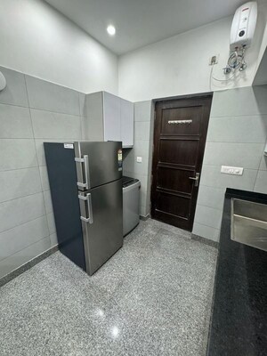Kitchen in 2 BHK Builder Floor at Greater Kailash – for Rent