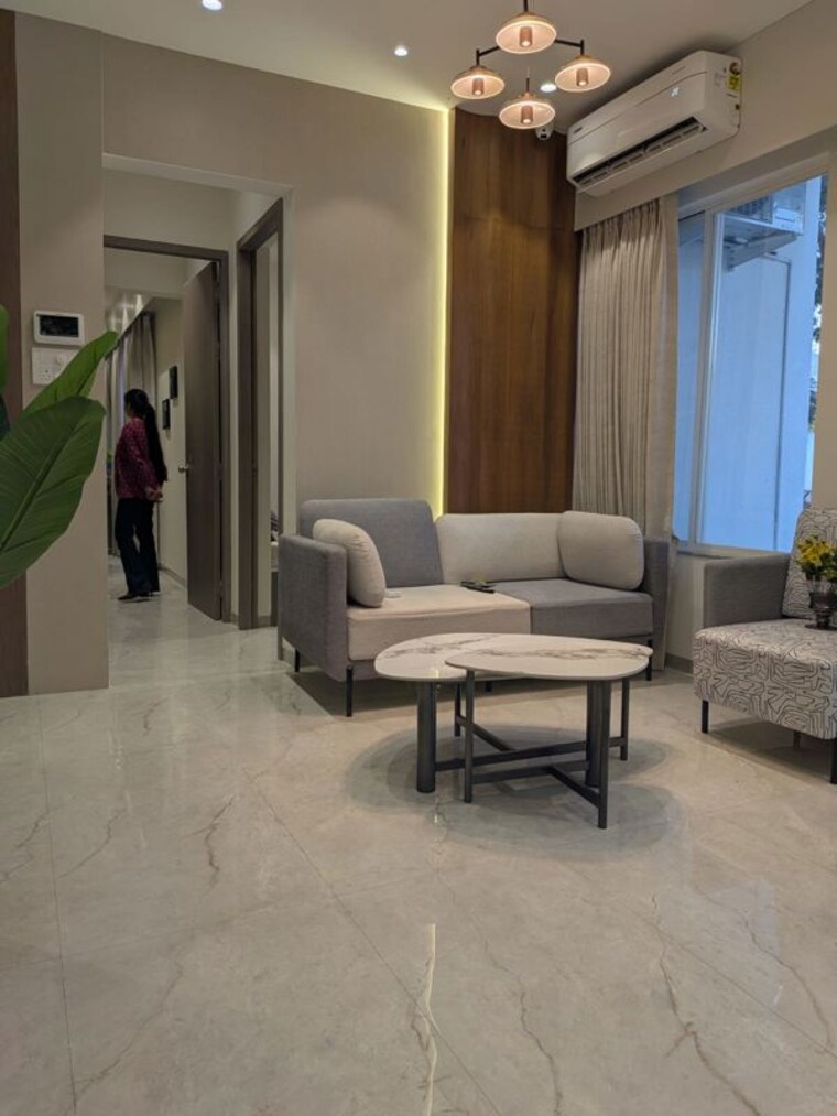 Living Room, sigma-centuria 2 Bedroom 674 Sq.Ft. Apartment In Kale Padal Pune 10602082