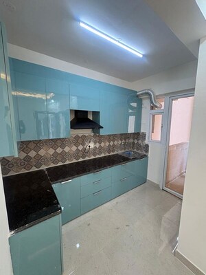 Kitchen in 2 BHK Apartment at Signature The Millennia 3, Sector 37d – for Rent