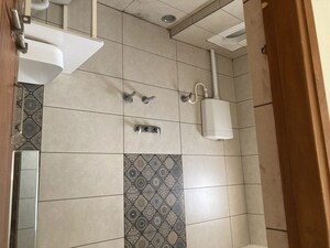 Bathroom in 2 BHK Apartment at Shakti Nagar – for Rent