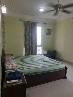 Bedroom in 3 BHK Apartment at DLF Hamilton Court, Sector 27 – for Rent