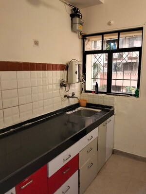 Kitchen in 1 BHK Apartment at Highland Residency CHSL, Balkum Pada – for Rent