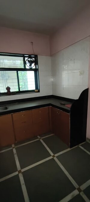 Kitchen in 1 BHK Apartment at Om Sai Plaza, Ghodbunder Road – for Sale
