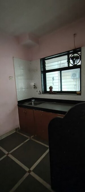 Kitchen in 1 BHK Apartment at Om Sai Plaza, Ghodbunder Road – for Sale