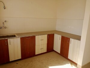 Kitchen in 3 BHK Apartment at Newtech La Palacia, Tech Zone 4 Greater Noida – for Rent