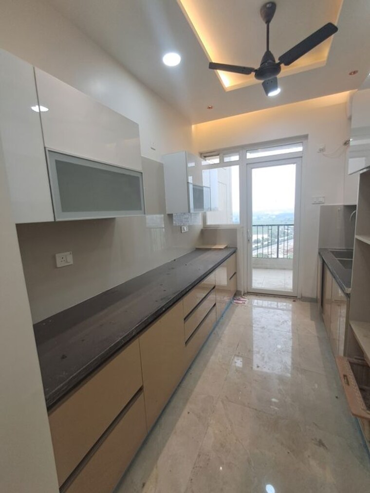 Kitchen, artique-uptown-skylla 3 Bedroom 1625 Sq.Ft. Apartment In International Airport Road Zirakpur 10602246
