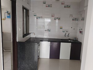Kitchen in 2 BHK Apartment at Jhala Rajyog Annexe, Sinhagad Road – for Rent
