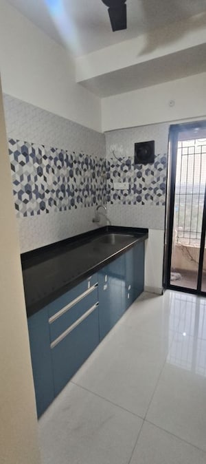 Kitchen in 2 BHK Apartment at Raunak City, Kalyan West – for Sale