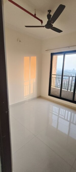 Room in 2 BHK Apartment at Raunak City, Kalyan West – for Sale
