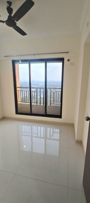 Room in 2 BHK Apartment at Raunak City, Kalyan West – for Sale