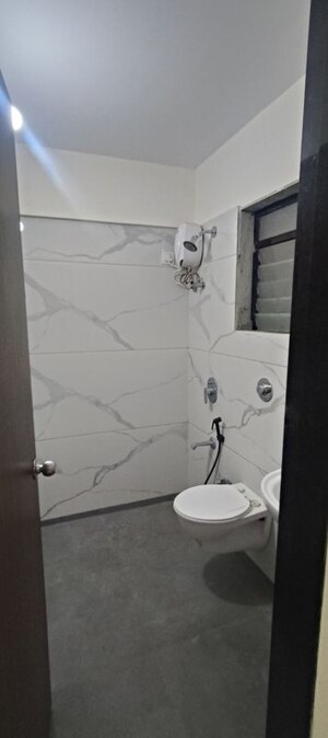 Bathroom in 2 BHK Apartment at Raunak City, Kalyan West – for Sale