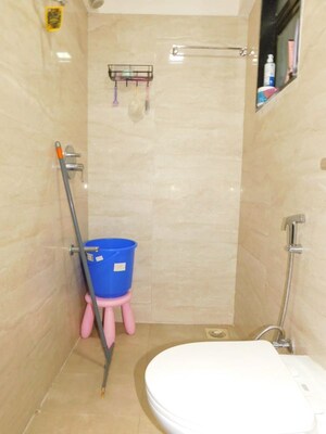 Bathroom in 2 BHK Apartment at Sangam Veda, Andheri East – for Sale