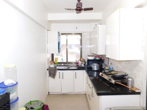 Kitchen in 2 BHK Apartment at Sangam Veda, Andheri East – for Sale