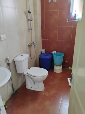 Bathroom in 2 BHK Apartment at Dhakoli – for Sale