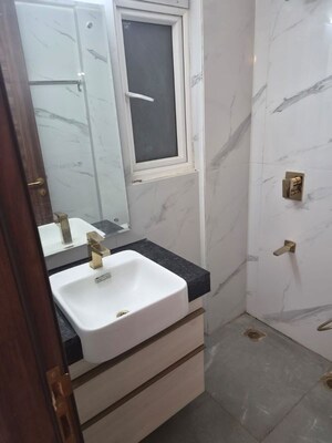 Bathroom in 3 BHK Apartment at Smart World Orchard, Sector 61 – for Rent