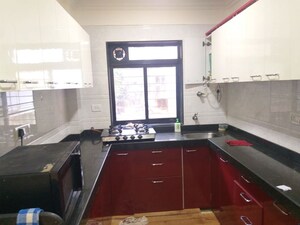 Kitchen in 1 BHK Apartment at Flower Queen, Andheri West – for Rent
