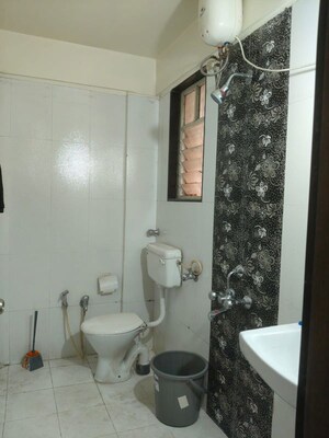 Bathroom in 3 BHK Apartment at Celebria Apartment, Hadapsar – for Rent