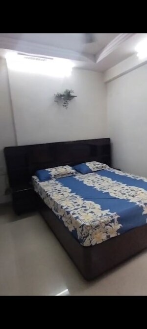 Bedroom in 2 BHK Apartment at Andheri CHS, Andheri West – for Rent