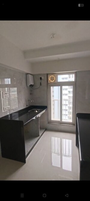 Kitchen in 2 BHK Apartment at Zee Ashtavinayak, Andheri West – for Sale