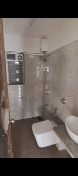 Bathroom in 2 BHK Apartment at Zee Ashtavinayak, Andheri West – for Sale