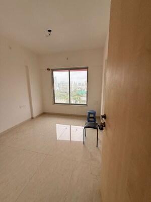 Room in 2 BHK Apartment at Parekh Celeste, Goregaon West – for Sale