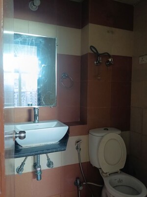 Bathroom in 2.5 BHK Apartment at Mahagun My Woods, Sector 16c Greater Noida – for Rent