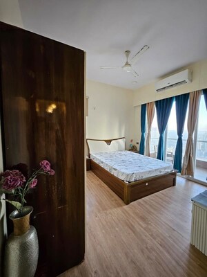 Bedroom in 2 BHK Apartment at Omkar Alta Monte, Malad East – for Rent