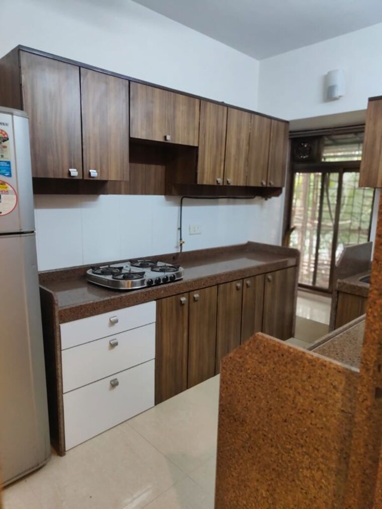 Kitchen, indralok-apartments-andheri 1 Bedroom 550 Sq.Ft. Apartment In Andheri West Mumbai 10602614