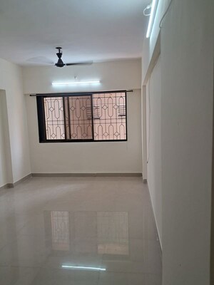 Bathroom in 2 BHK Apartment at Balkum Pada – for Rent