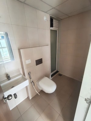 Bathroom in 2 BHK Apartment at Godrej Emerald, Ghodbunder Road – for Rent