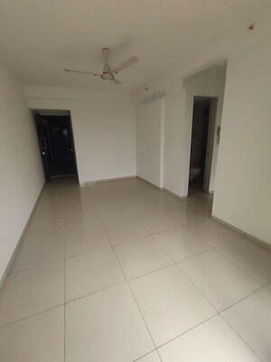 Living Room in 2 BHK Apartment at Godrej Emerald, Ghodbunder Road – for Rent