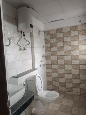 Bathroom in 2 BHK Apartment at Shri Radha Aqua Garden, Sector 16b Greater Noida – for Rent