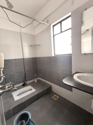 Kitchen in 2 BHK Apartment at Kolte Patil Margosa Heights, Mohammadwadi – for Rent